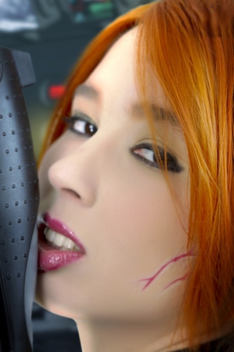 Sexy redhead works her female parts free of her cosplay outfit
