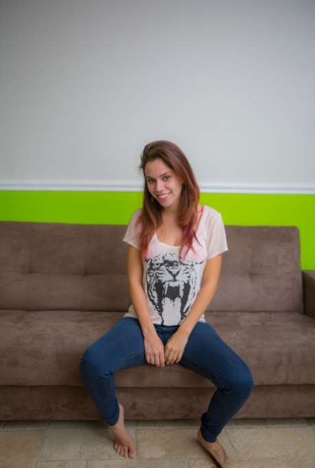 Slender amateur Marina Rossi doffs her pink bra and panties to pose nude