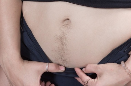 First timer Pixxy reveals her unshaven female body parts one at a time