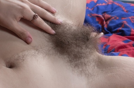 First timer Pixxy reveals her unshaven female body parts one at a time