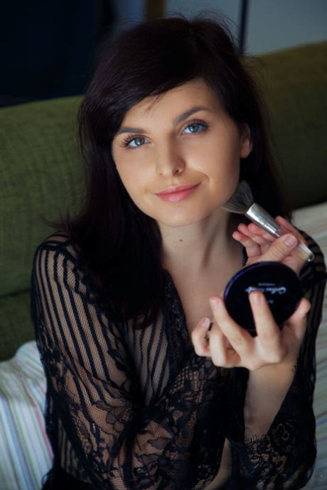 Young brunette Flaca sticks a dildo in her pussy while on a sofa