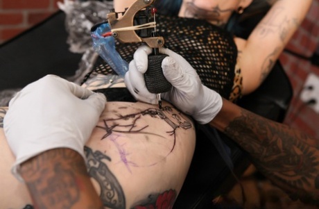 Tattooed girl Sascha Ink gets fresh ink before sex with a tattooed man