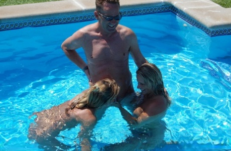 Sweet Susi has a threesome with a couple in a swimming pool