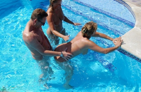 Sweet Susi has a threesome with a couple in a swimming pool