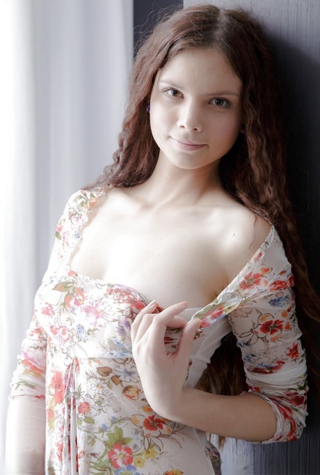 Beautiful young babe Mary revealing perfect teen tits and bald cooter