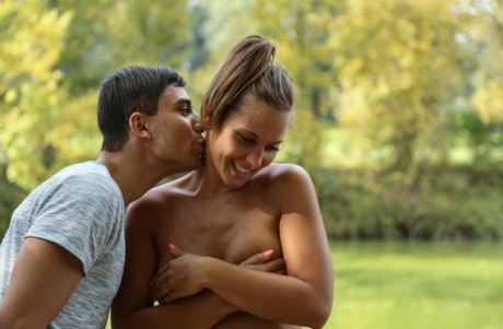 Naomi Bennet and her perky teen tits aid in pleasing bf during lakeside fuck