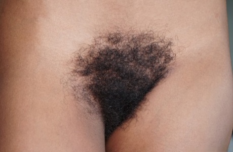 Afro-American beauty Sofia Cuty shows her big boobs & bushy twat as she strips
