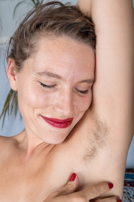 Amateur wife with red lipstick Bridgette Aleister fingers her bushy twat