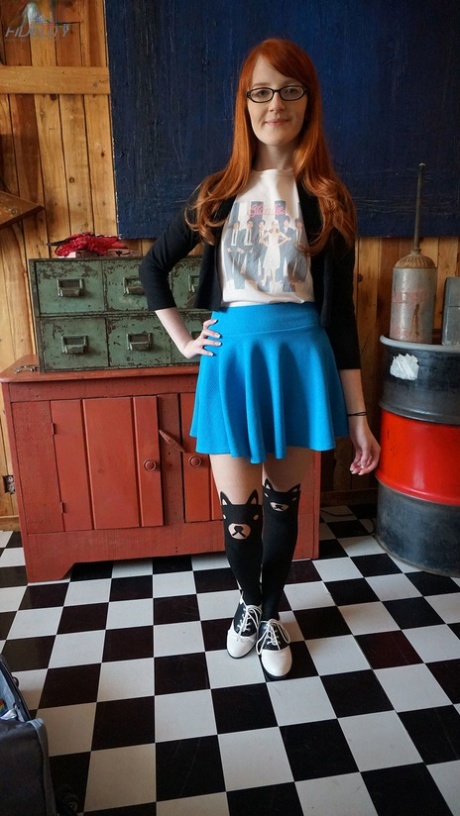 Nerdy redheaded teen Krystal Orchid gets penetrated by a large cock after