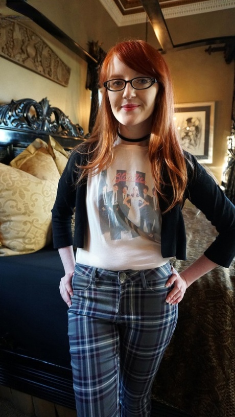 Nerdy redheaded teen Krystal Orchid gets penetrated by a large cock after