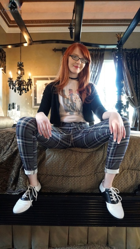 Nerdy redheaded teen Krystal Orchid gets penetrated by a large cock after