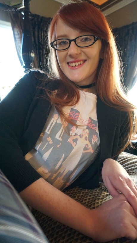 Nerdy redheaded teen Krystal Orchid gets penetrated by a large cock after