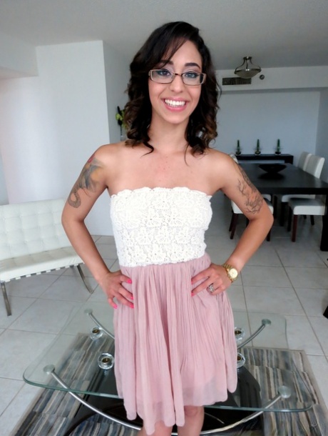 Bespectacled hottie in sheer dress gets on knees for wild drippy POV cumshot