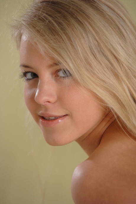 Charming blonde Barbara D reveals her hot teenage body before going to sleep
