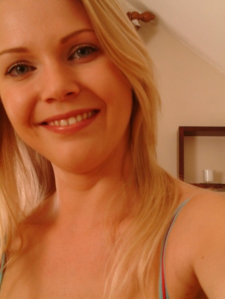 Teen with small breasts Abigail touching her bald vagina in her bedroom