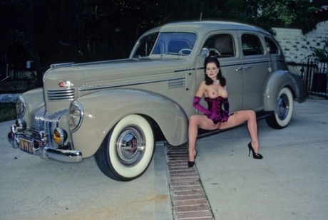 Centerfold Dita Von Teese showing her firm tits & her nice bush in nylons