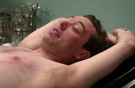 Naughty nurse Cole Conners has a BDSM session with a submissive male patient