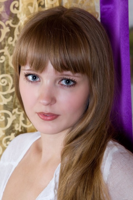 Gorgeous teen Wendy B posing and showing her furry pussy in a solo