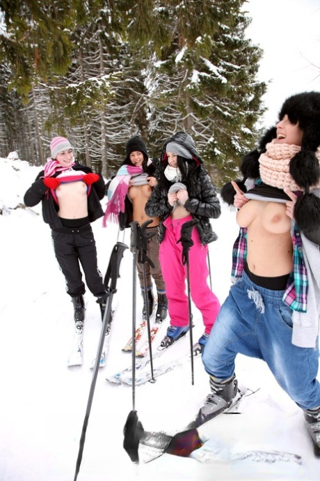 Kinky European teens undress and have hot groupsex after skiing all day