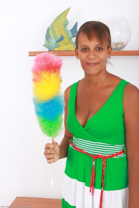 Amateur cleaning lady Christine exposes her big tits and hairy pussy in a solo
