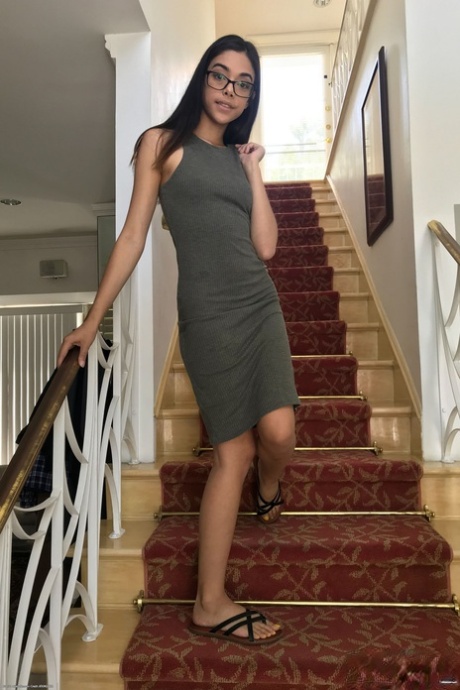 Slim nerdy teen Harmony Wonder hikes up her dress and touches her twat