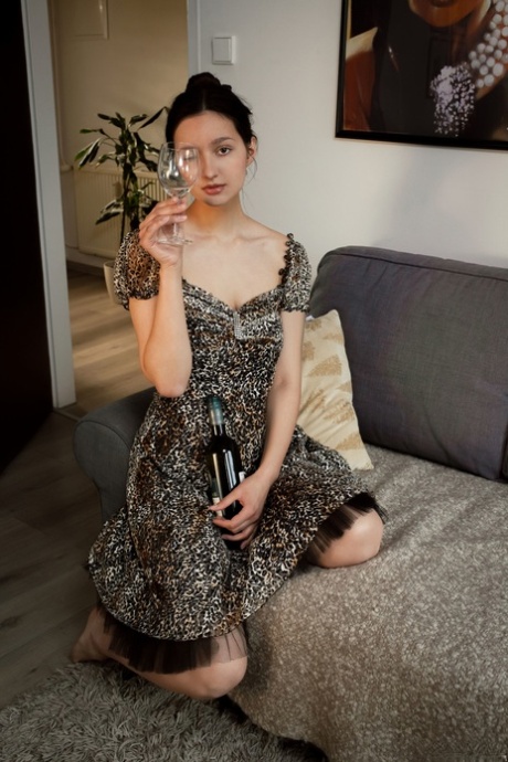 Beautiful teen Adeline shows off her big tits & her inviting hairy pussy