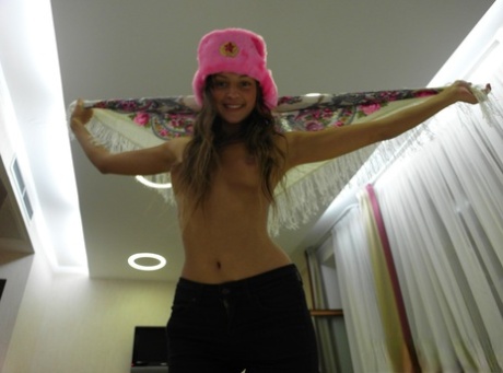 Skinny babe Melena Tara posing and fingering her beaver in a solo