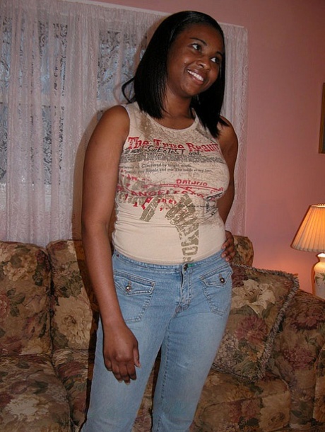 Petite ebony fatty Charm strips & shows her big tits & ass at a casting