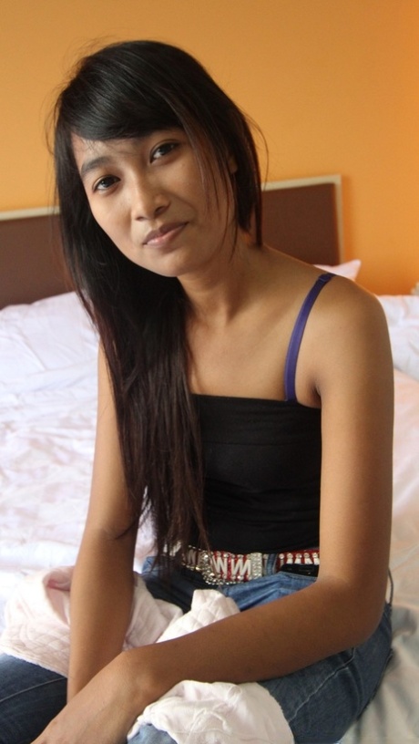 Pretty Asian babe Lidia shows her hairy pussy before & after POV sex