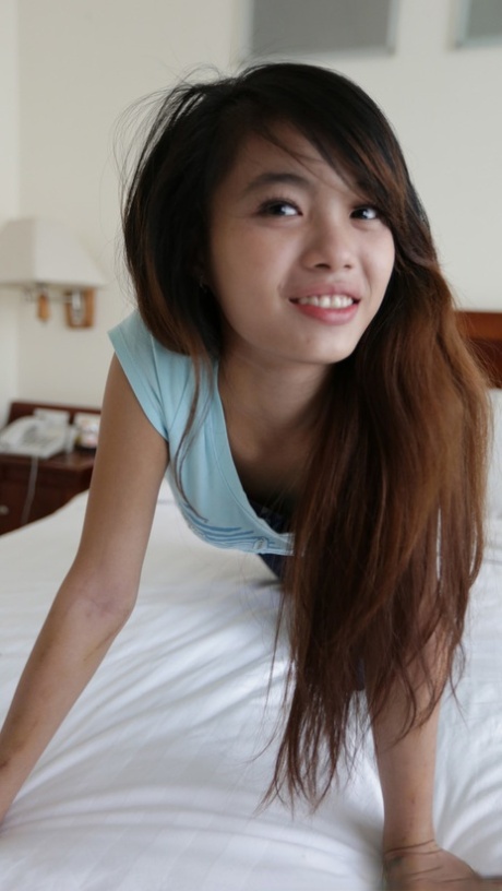 Asian amateur Lan B reveals her skinny body and spreads her legs for a dick