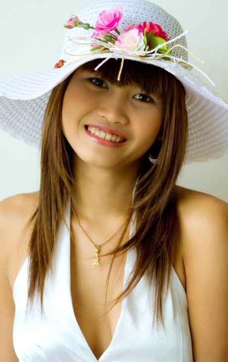 Cute Asian girl Yaya shows her tiny tits with puffy nipples & her shaved cunt