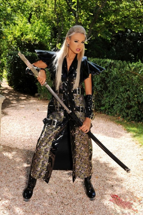 Blonde Czech samurai in black leather boots Ashley Bulgari masturbates outside