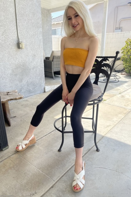 Blonde teen Scarlett Hampton shows off her puffy pussy up close