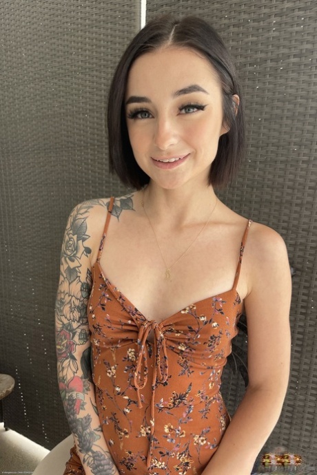 Pretty skinny teen Stevie Moon exposes her tattoos, tiny tits and twat