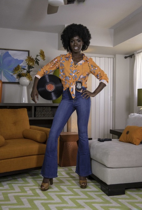 Ebony with an afro Ana Foxxx strips and flaunts her black butt in a solo