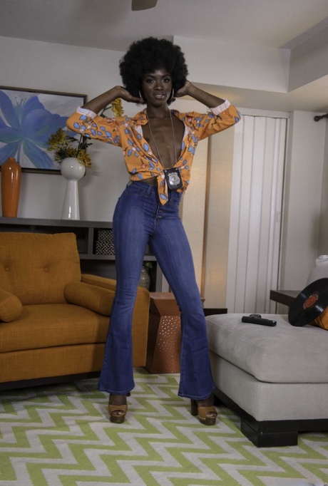 Ebony with an afro Ana Foxxx strips and flaunts her black butt in a solo
